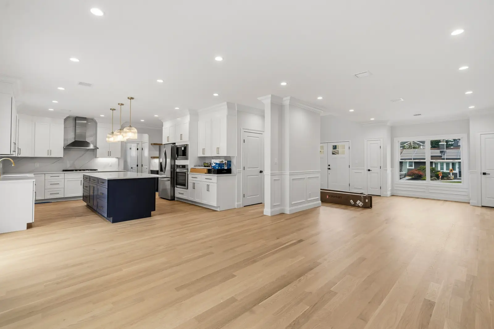 Syosset new construction — open kitchen and family room