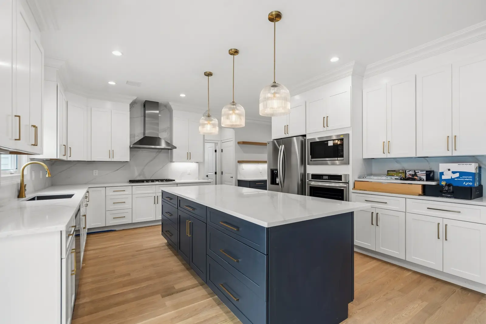 Syosset new construction — kitchen island with pendant lights
