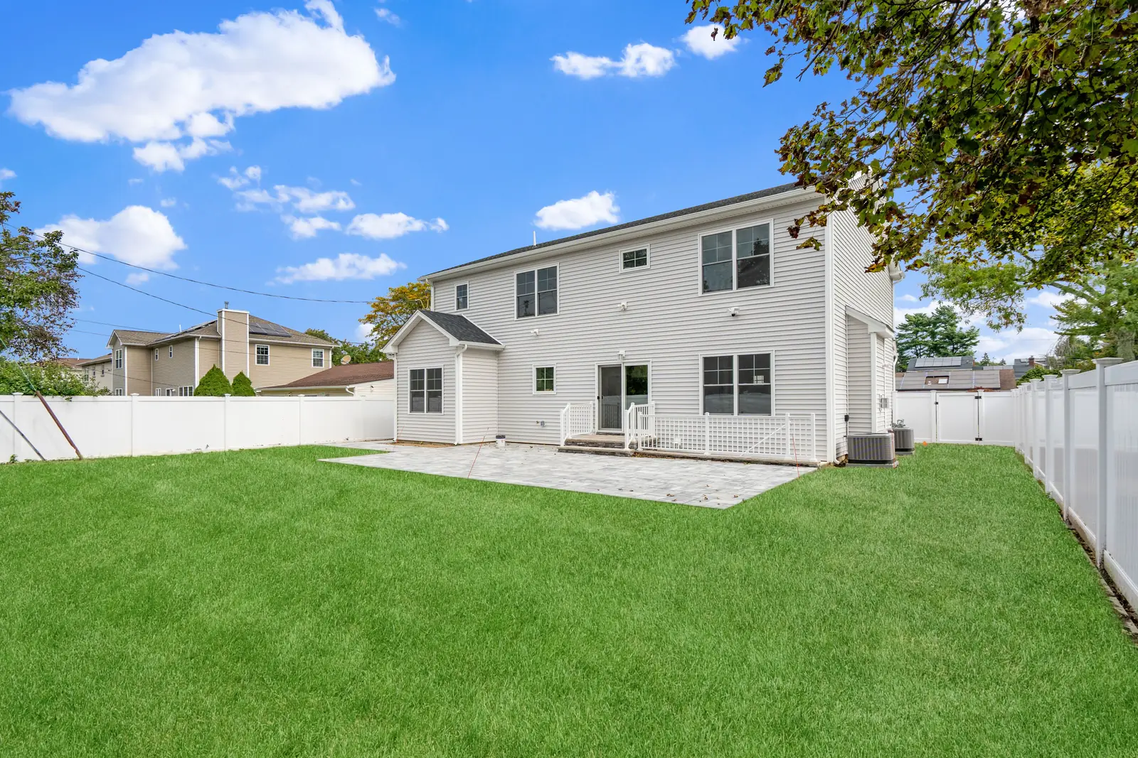Syosset new construction — backyard patio