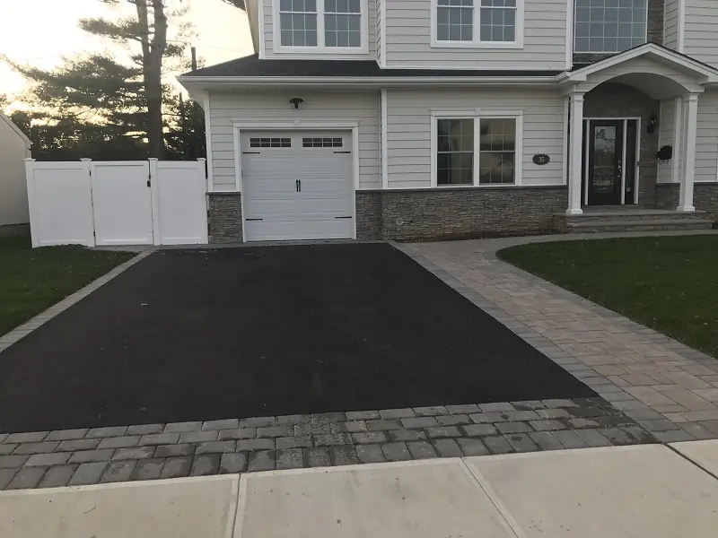 Masonry & Paving project — blacktop driveway