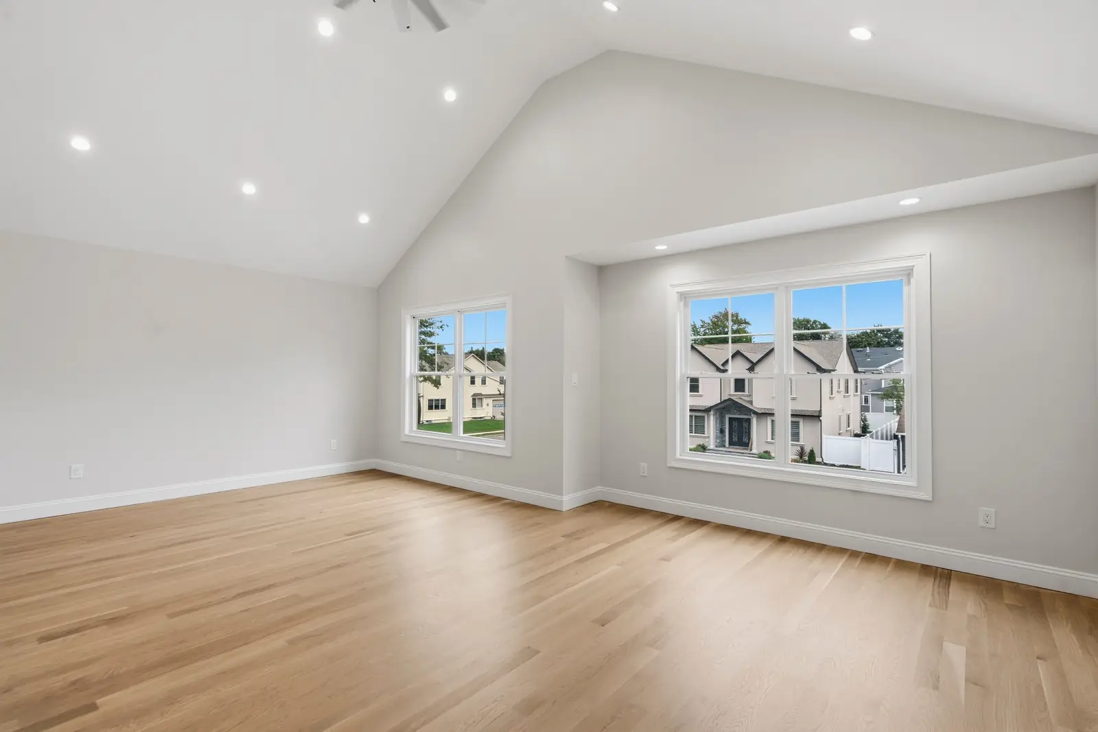 Syosset new construction — primary suite vaulted ceiling